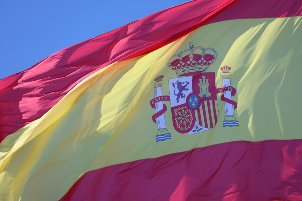 vibrant spanish flag waving in cadiz spain